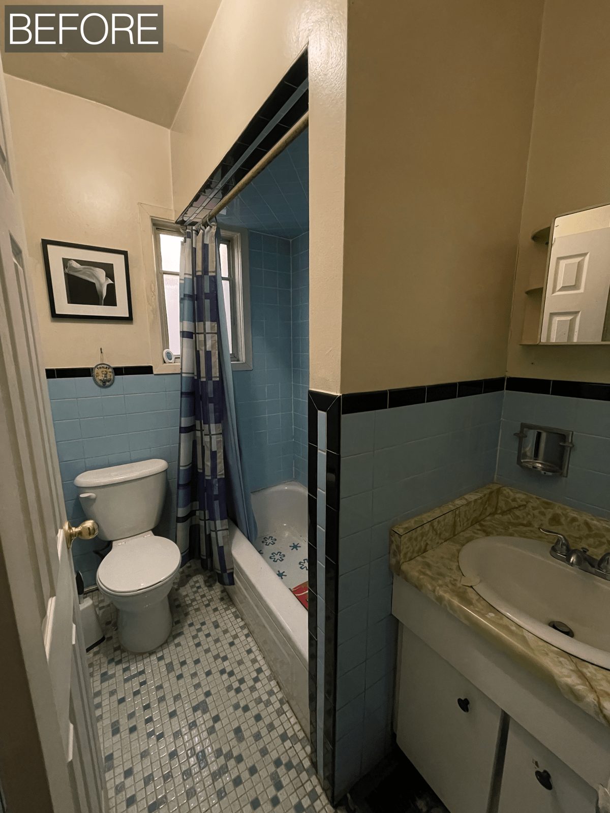 Bright renovated ensuite bathroom in Toronto with light porcelain tile, new vanity and mirrored medicine cabinet, view 3