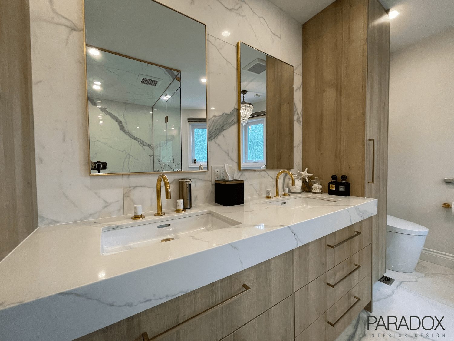 Renovated primary bathroom in Toronto with freestanding soaker tub, oversized steam shower and custom millwork, view 4
